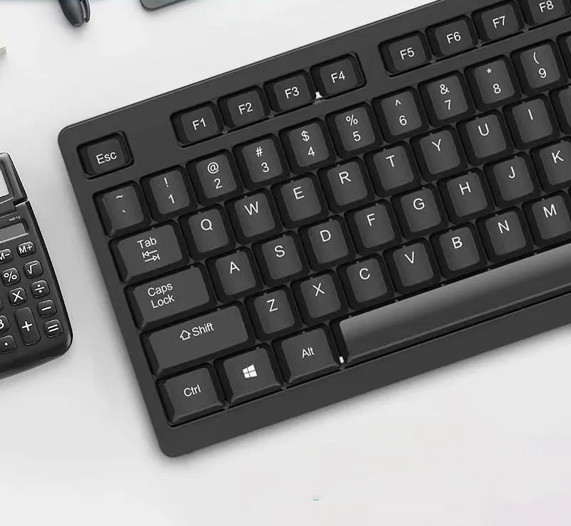 Black KM160 wired USB keyboard and mouse set with 1.5m cables on a desk