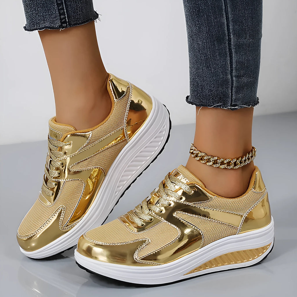 Women's fashionable thick bottom mesh elevator breathable shoes in gold colour with cross strap design