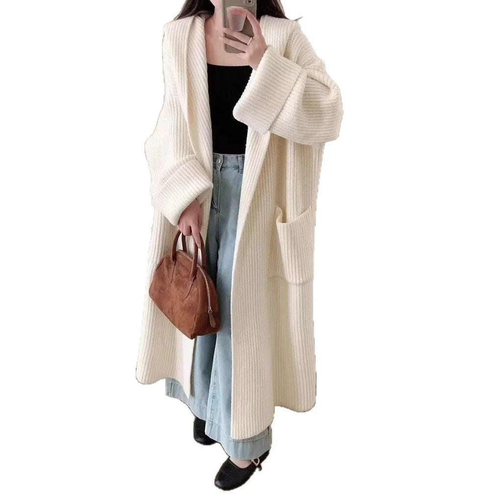 Women's loose-fitting hooded cardigan coat in acrylic fibre, shown in a neutral colour.
