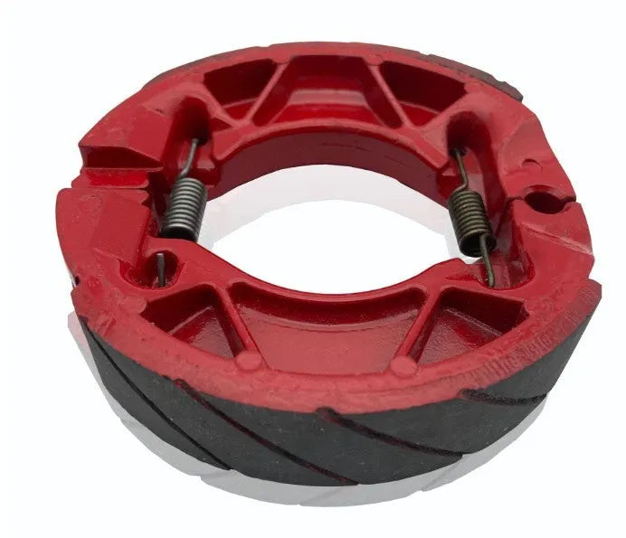 YBR125 motorcycle brake rubber block in black and red with metal backing