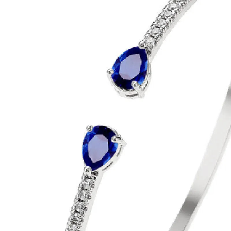 Multi-zircon personalised bracelet with inlaid detailing on copper in blue and white options