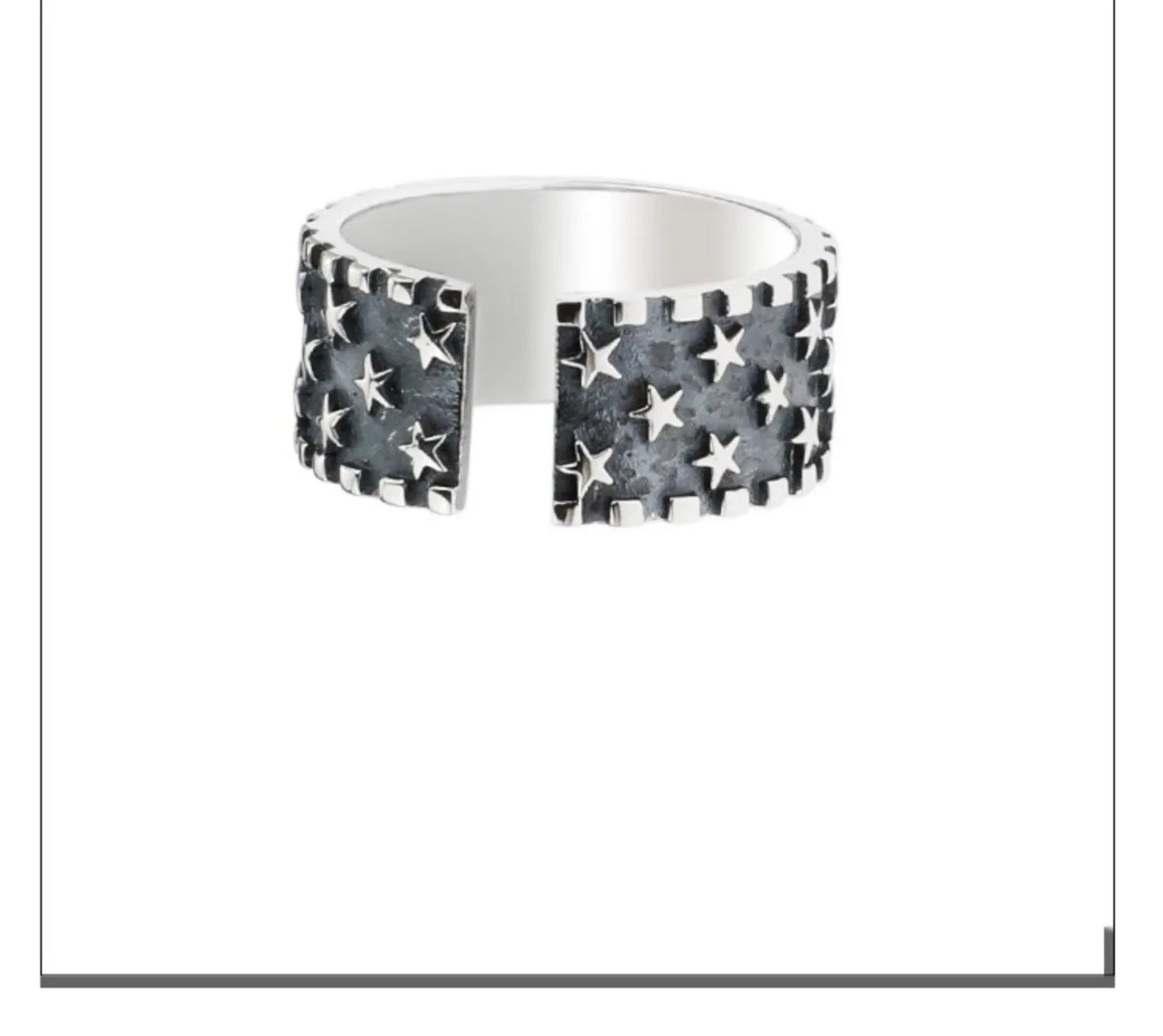 Adjustable silver ring with a geometric pattern of multiple five-pointed stars on a white background.