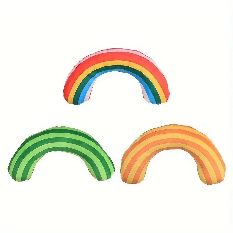 Set of four cat toys including a noise maker and a green striped catnip pillow on a neutral background.