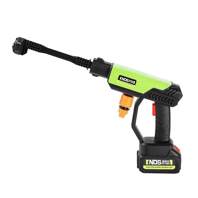 Green cordless high-pressure water gun with adjustable nozzle and accessory attachments