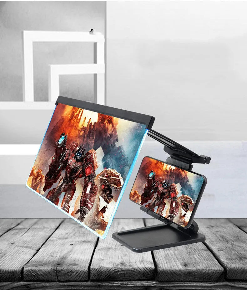 Black folding mobile phone screen amplifier with detachable phone holder on desktop
