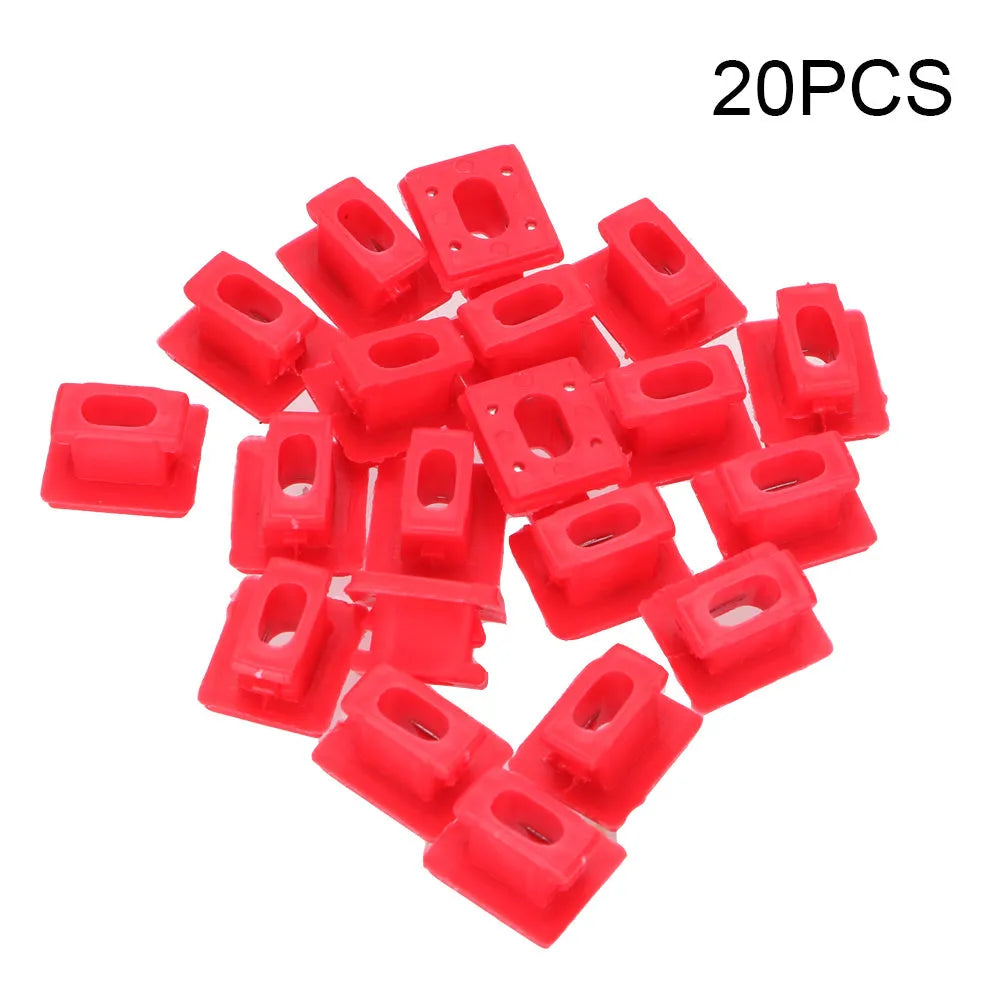 10 plastic BMW interior door trim panel repair clips and buckles on a white background