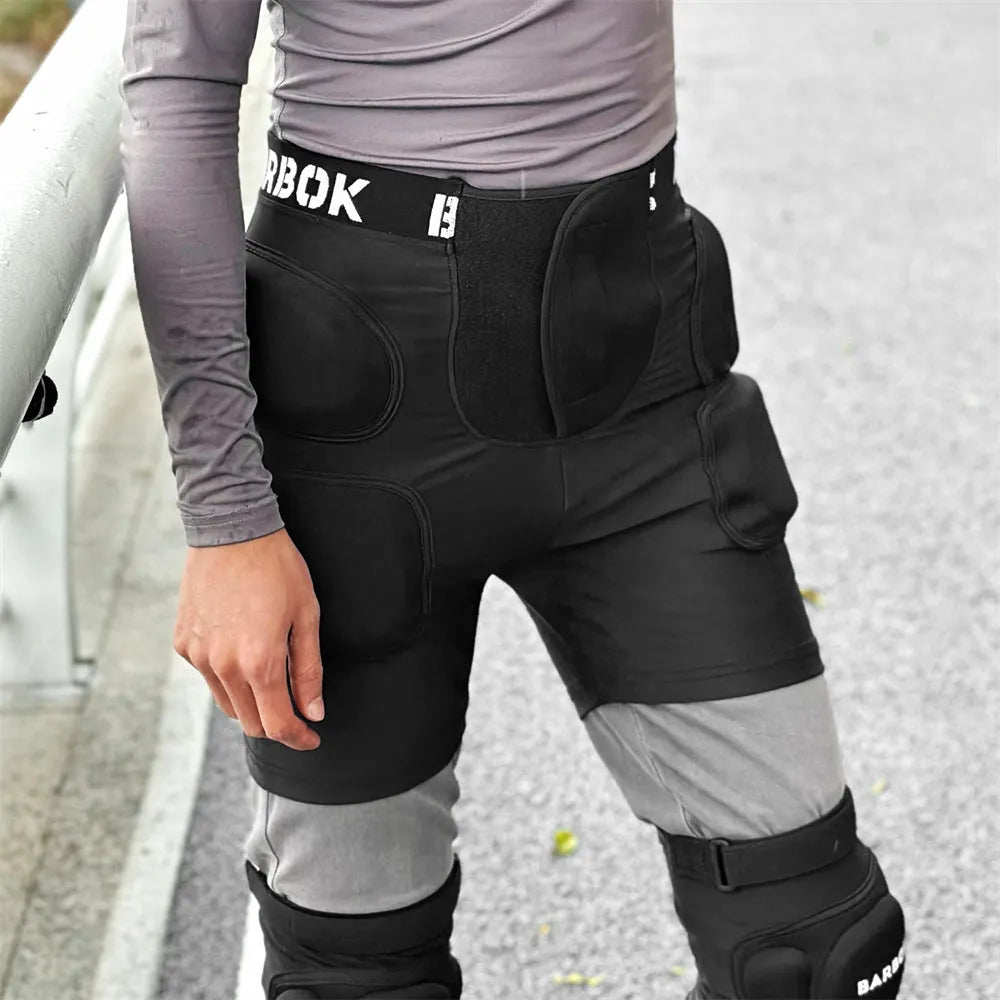 Black spandex hip protection pad with protective foam for skating and skiing.