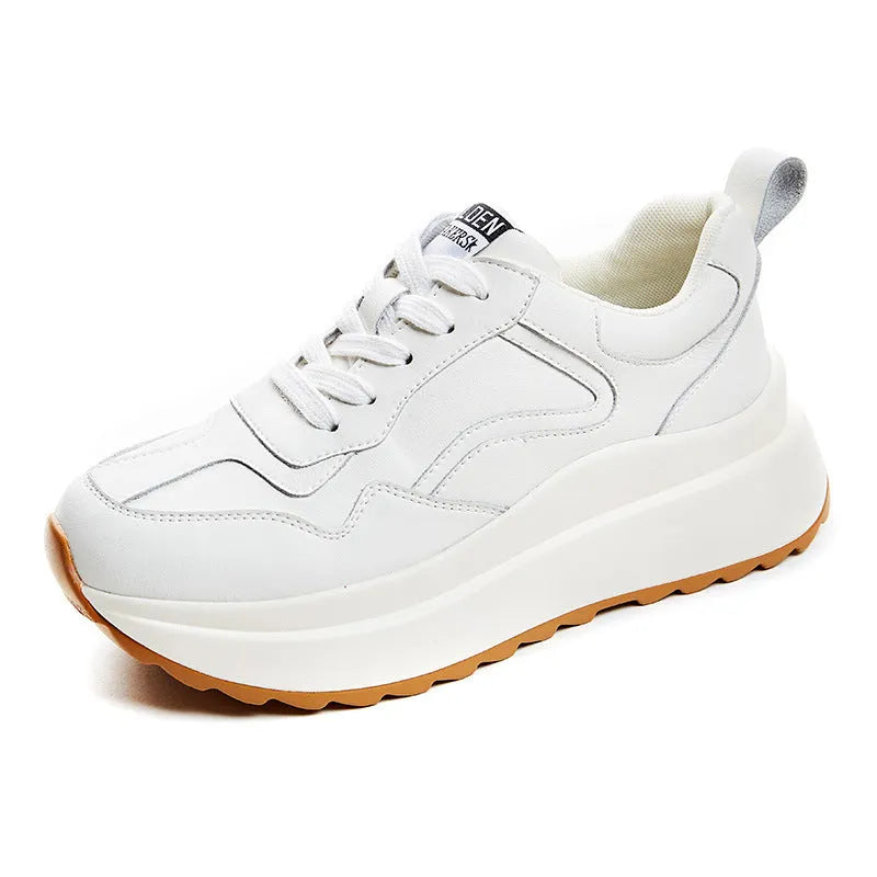 Women's beige low-top lace-up sports shoes made from cattlehide leather with a cross strap detail.