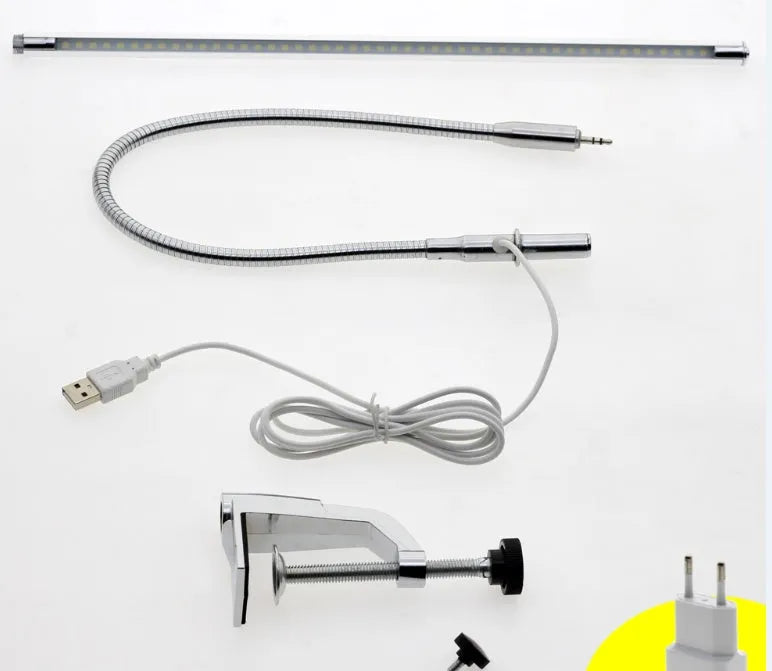 Silver aluminium alloy LED clip table lamp with long arm for nail art and crafting, showing clip attachment and USB cable