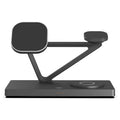 White five-in-one wireless charging station with magnetic phone bracket, circular pad, and watch dock, showing a night light glow.