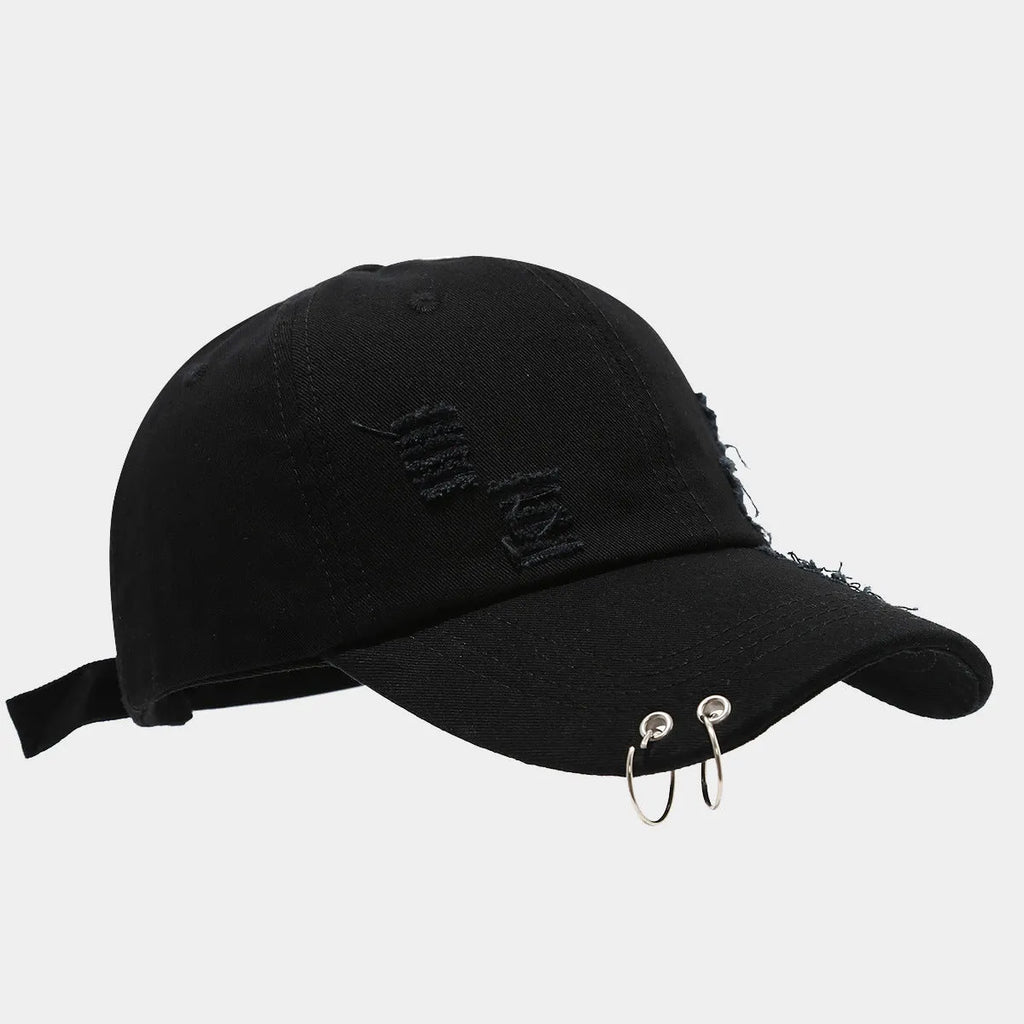 Men's adjustable cotton denim baseball cap in black on a plain background.