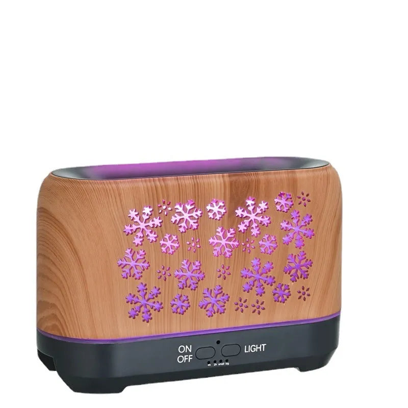 Square woodgrain aromatherapy humidifier with colourful snowflake pattern and multicoloured flame light effect.