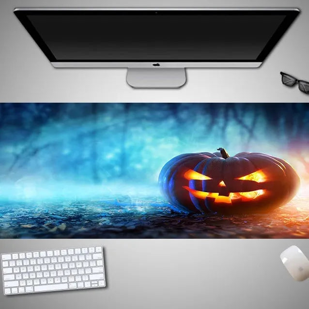 Halloween-themed oversized mouse pad showing rubber cloth texture and non-slip base