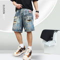 Men's blue ripped jeans shorts with graffiti details and straight leg opening
