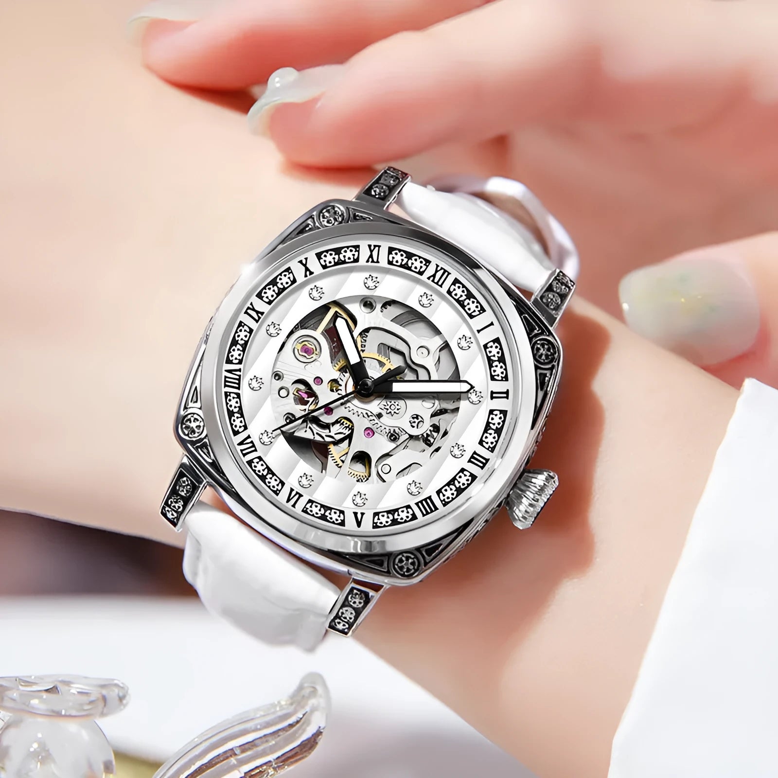 Men's mechanical watch with luminous hands on a leather strap, shown in black, red, steel, and white colour options.