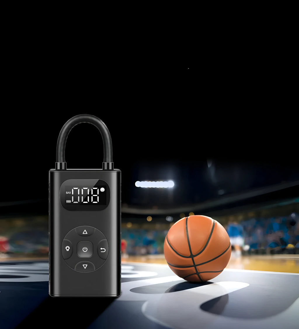 Black portable digital tyre inflator with power bank, USB cable, and 16cm tube on a grey background.