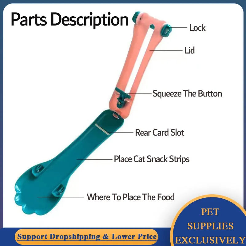 Green and pink plastic pet food squeezer feeder with a spoon-shaped dispensing end.