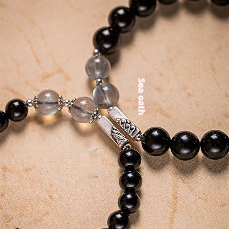 Obsidian Buddha beads couple bracelet DIY set showing 10mm men's and 8mm women's beads with national style patterns