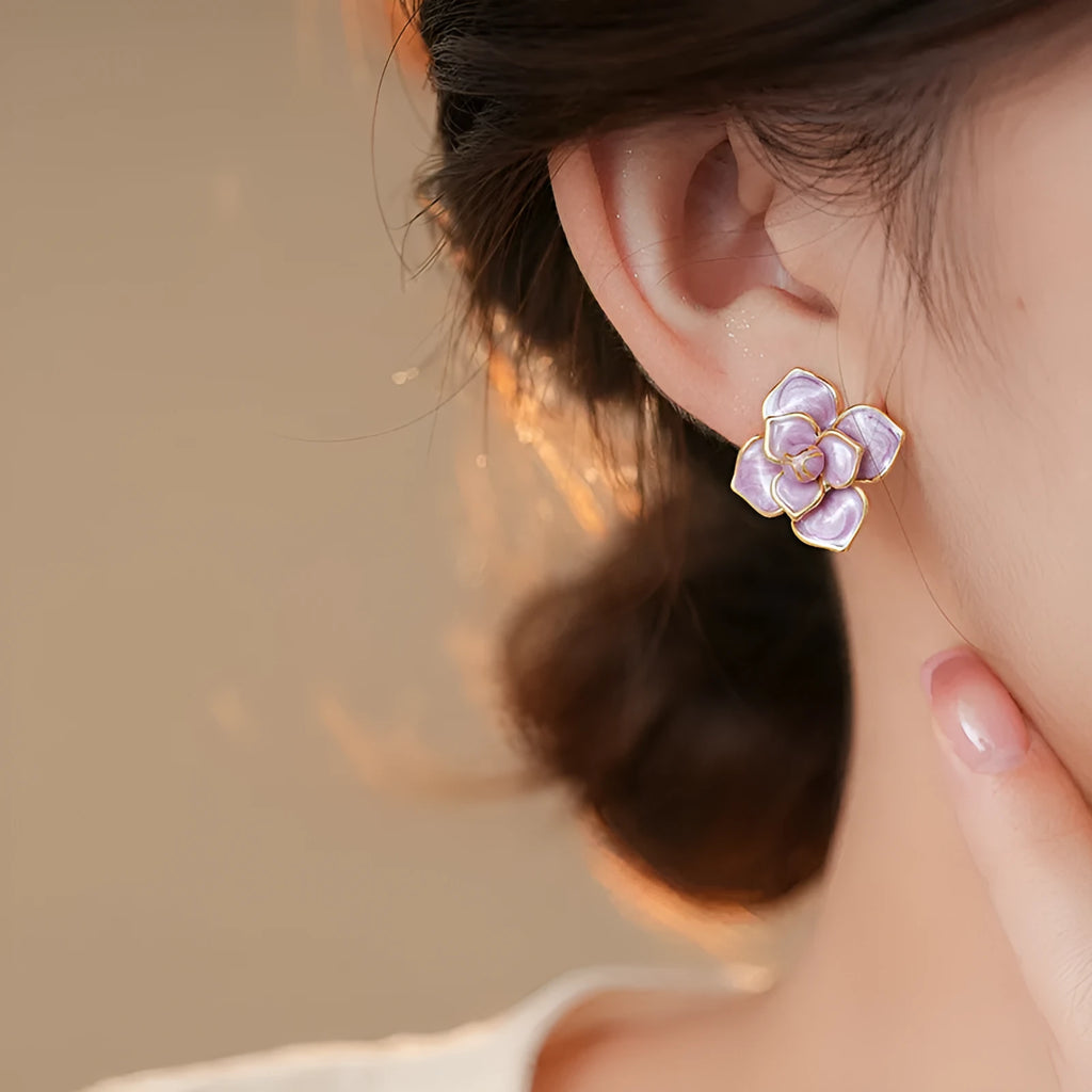 Purple and gold flower stud earrings with oil-spot glaze finish on copper bases
