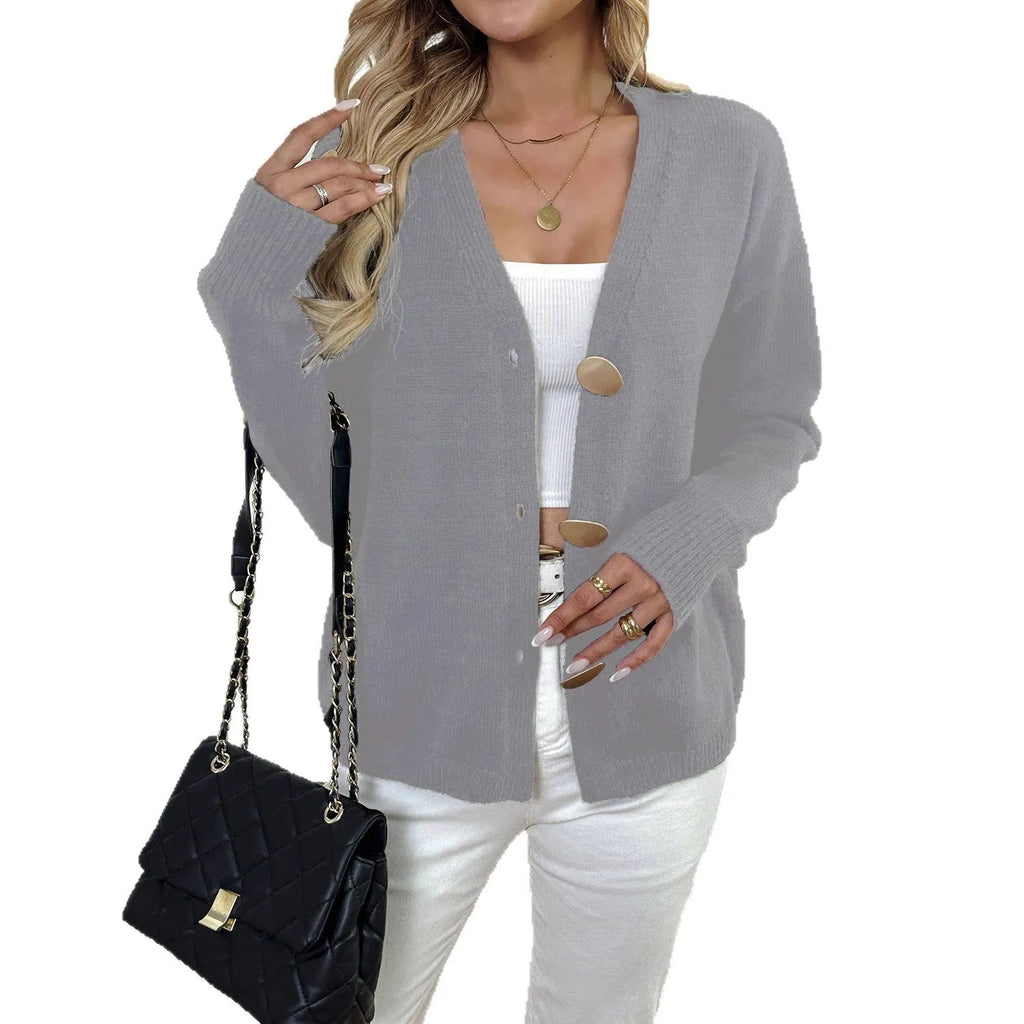 Women's deer plush sweater coat with princess sleeves in black colour showing irregular cut design