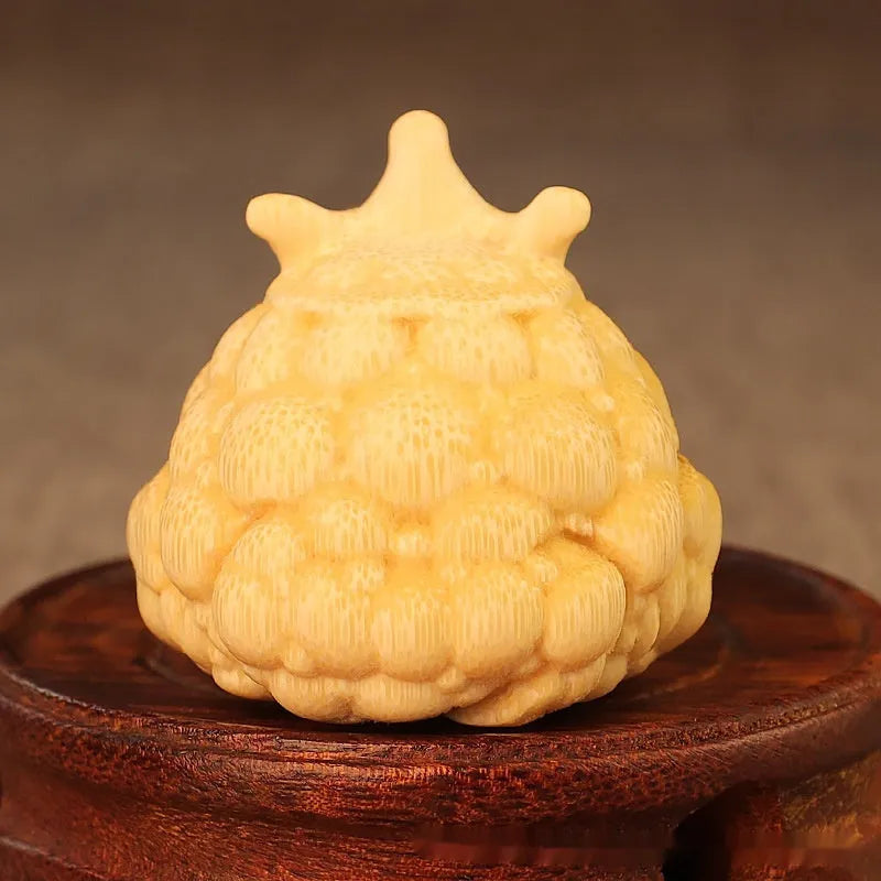 Solid bamboo carving of a Crown Princess Toad ornament with live eyes, 5.0cm.