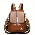 Simple ladies backpack in black with PU material and multiple pockets for commuting