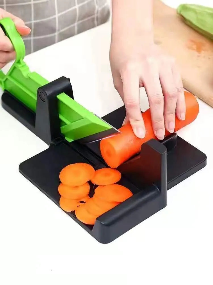 Green and red vegetable cutter with stainless steel blades for slicing carrots and potatoes