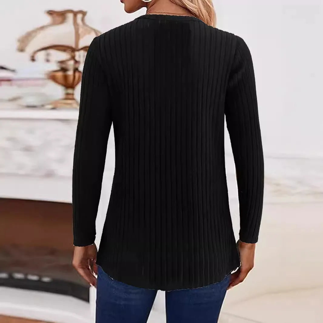 Casual grey green knitted pullover sweater with button fastening detail on the front.