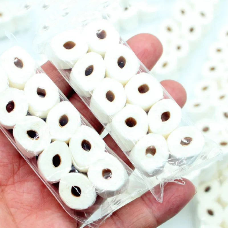 Miniature paper simulated tissue roll model for dollhouse play, measuring 30mm by 15mm by 80mm.