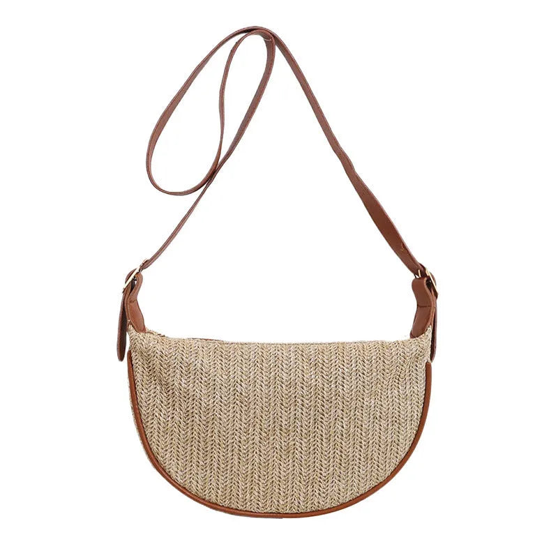 Women's knitted straw woven crossbody bag in corrugated black carrying phone and files
