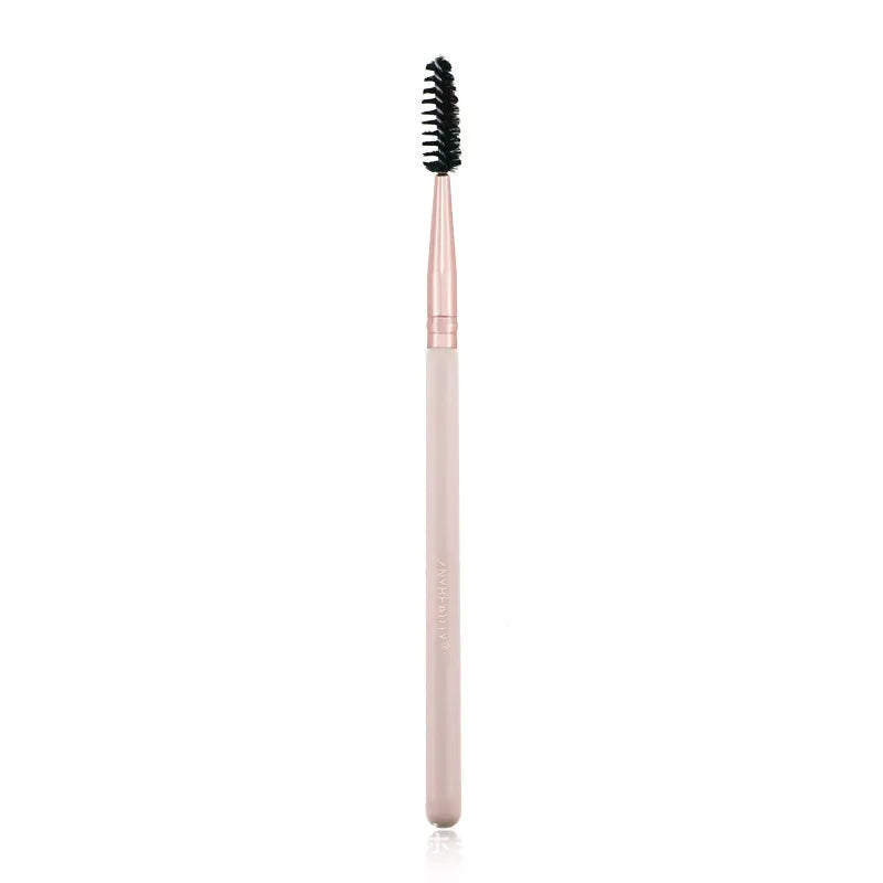 26 pink makeup brushes with wooden handles arranged in a PU carry case.