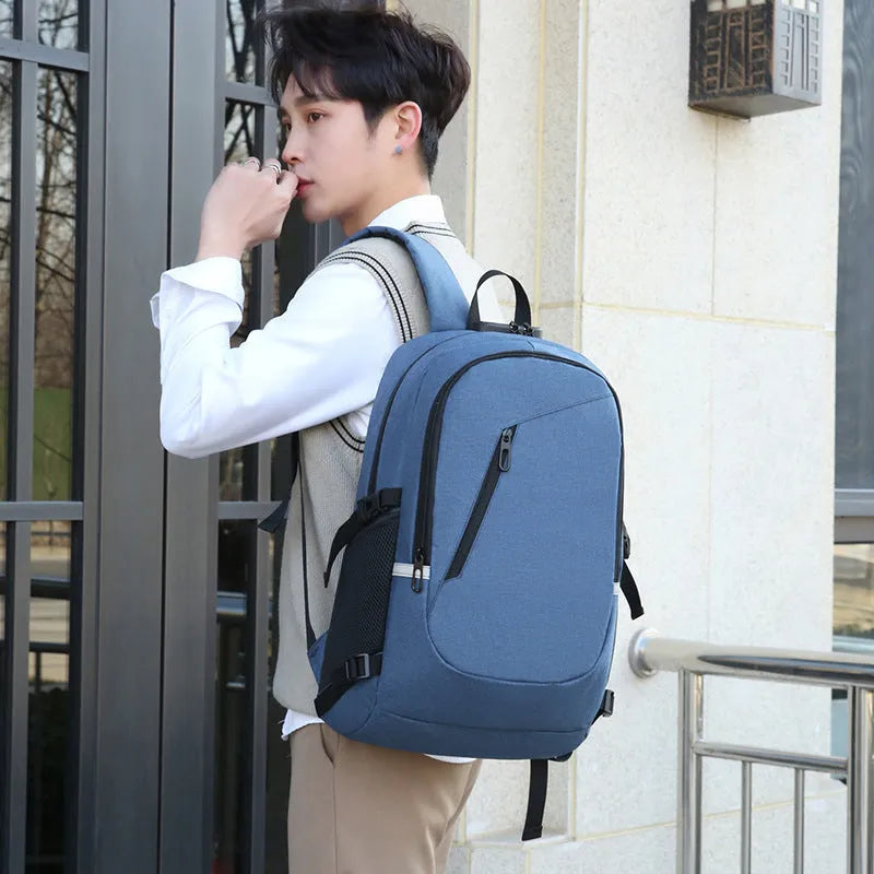 Oxford cloth computer backpack in blue colour showing front view with street trend styling
