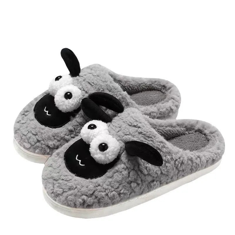 Brown, grey, and white suede slip-on slippers with a PVC sole on a plain background.