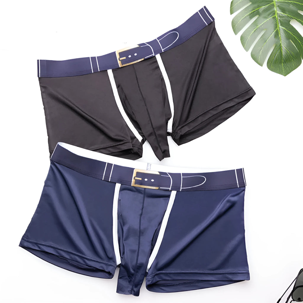 Men's solid colour ice silk boxer shorts in grey, shown laid flat, featuring a mid waist design.