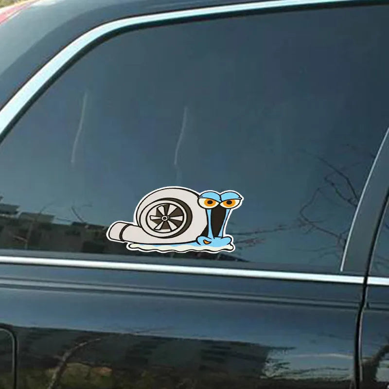 White reflective cartoon snail car sticker measuring 12 by 8 centimetres