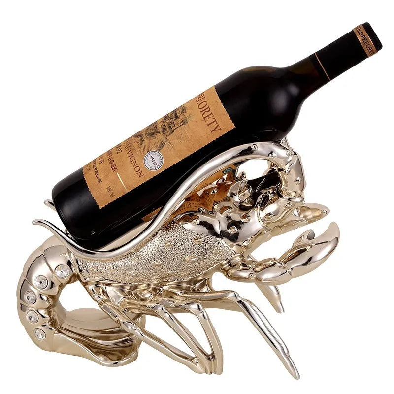 Lobster-shaped wine rack ornament in metallic finish displaying wine bottle