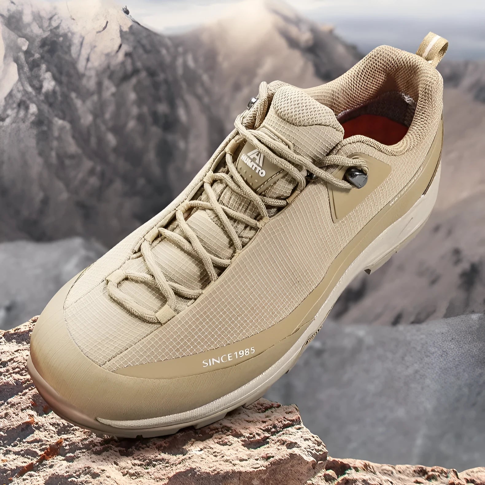 Men's low-top casual hiking boots in black with leather mesh upper and lace-up front.