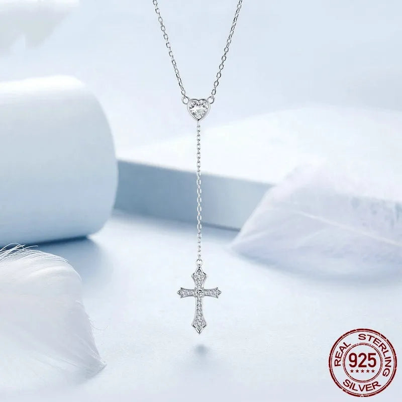 925 sterling silver Love Cross pendant necklace with V-neck design on an O-ring chain.