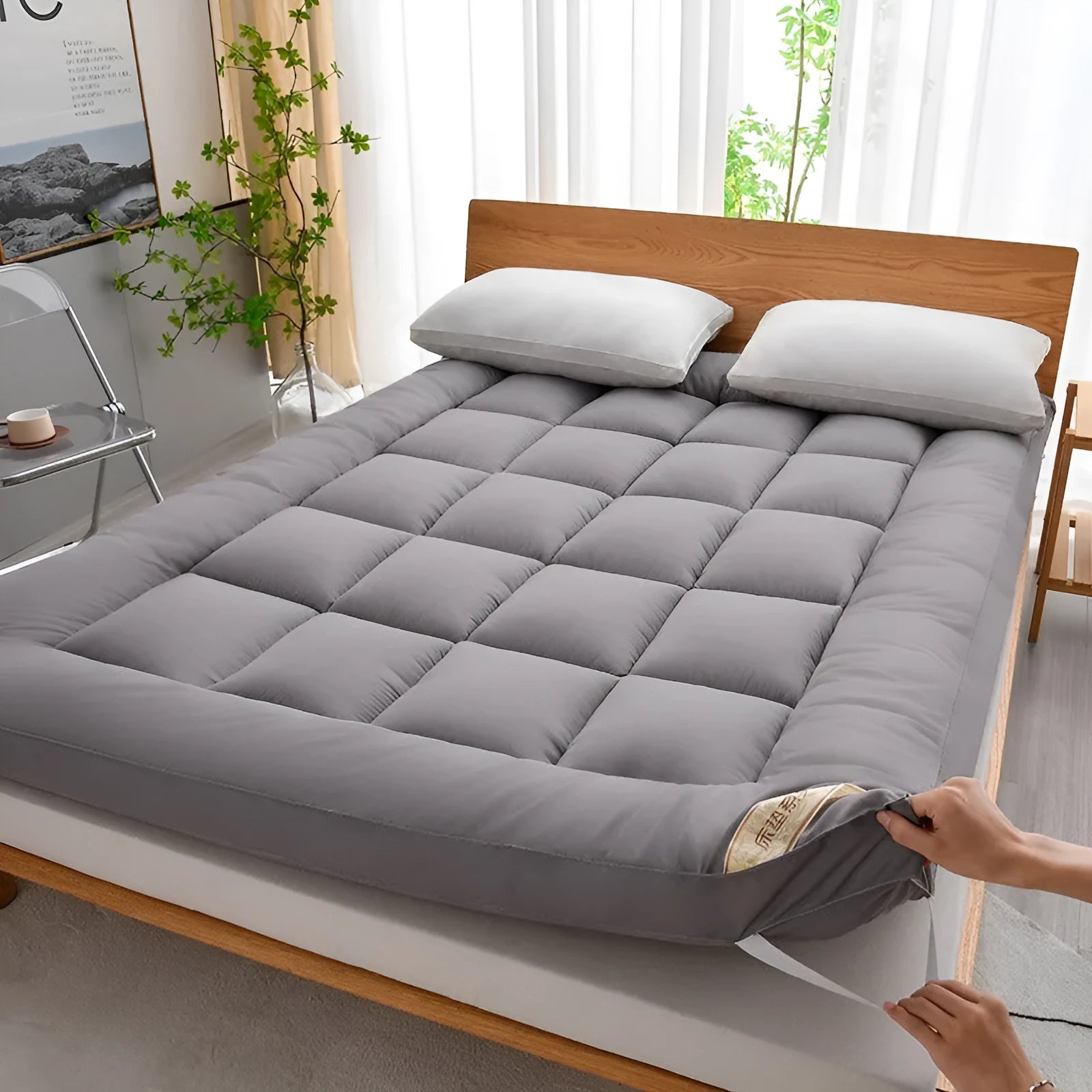 Thickened three-dimensional feather velvet mattress sheet in alpaca colour on a bed