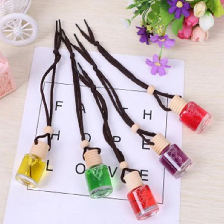 Car air freshener glass bottle hanging ornament with 55g net content, available in six scents including lavender and lemon