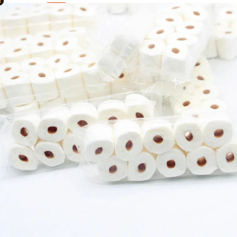 Miniature paper simulated tissue roll model for dollhouse play, measuring 30mm by 15mm by 80mm.