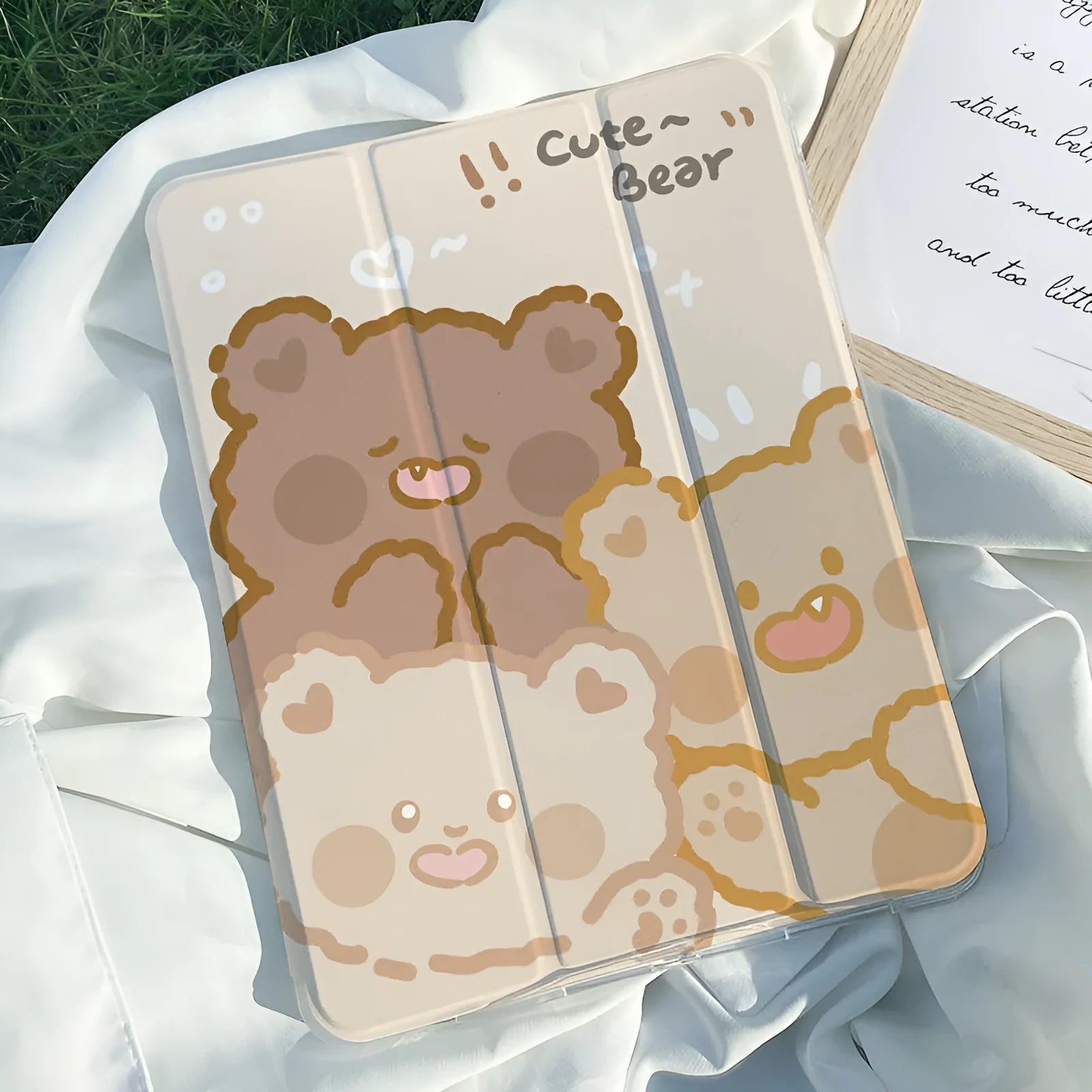 Silicone tri-fold iPad protective case with rabbit cartoon design, shown in stand mode.