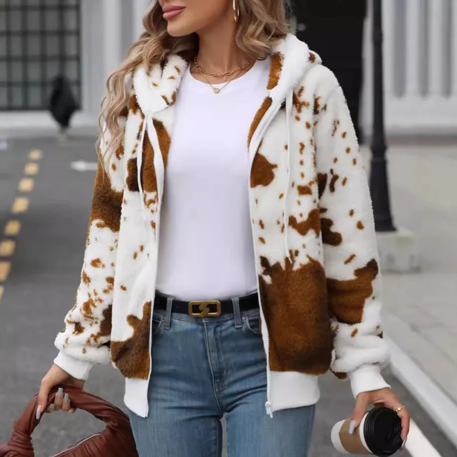 Yellow brown cow print hooded zip up cardigan jacket in plush polyester fabric.