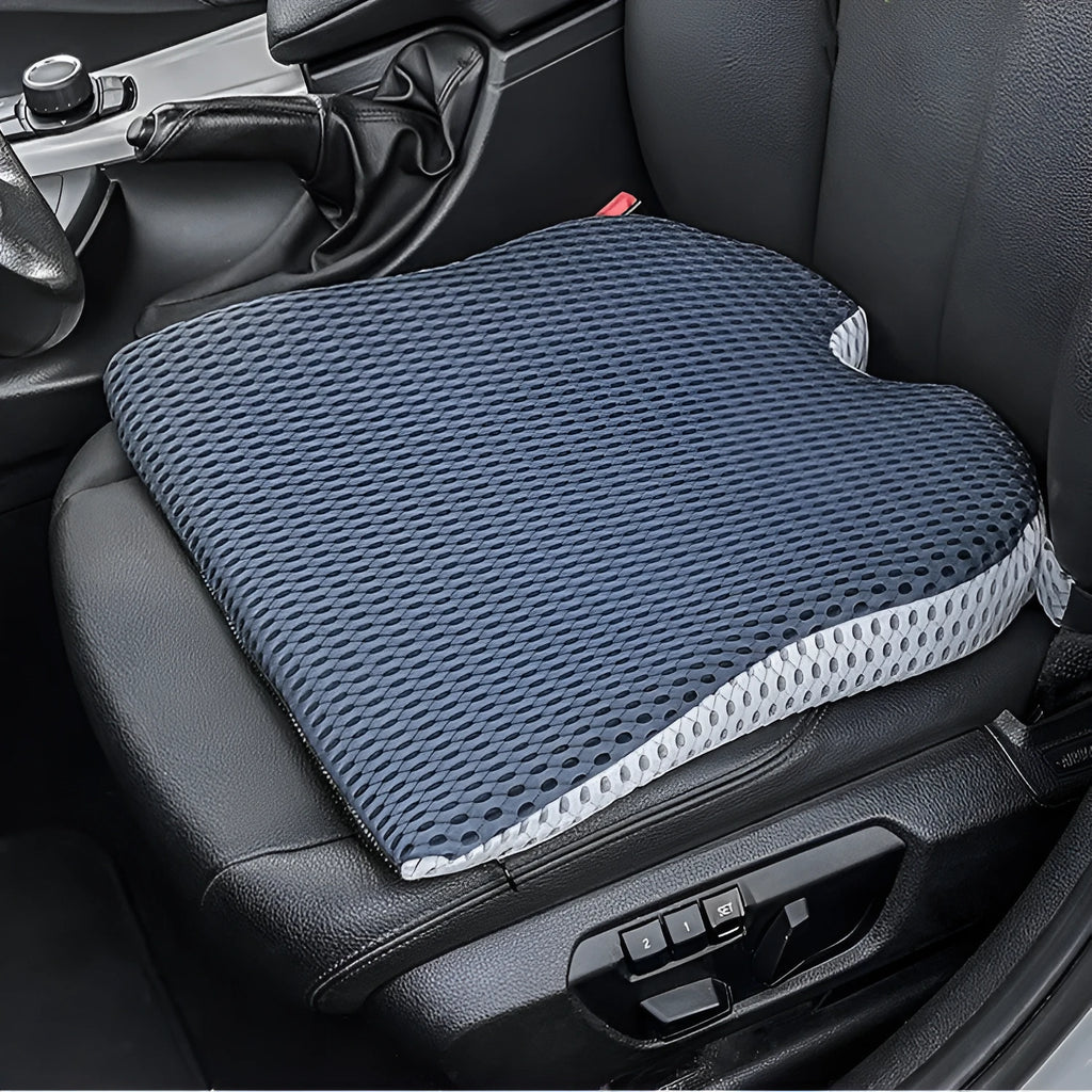 Memory foam seat cushion with adjustable strap shown in creamy white colour