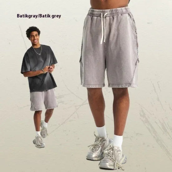 Men's batik washed patch cotton terry shorts in a loose retro street style, shown in batik black.