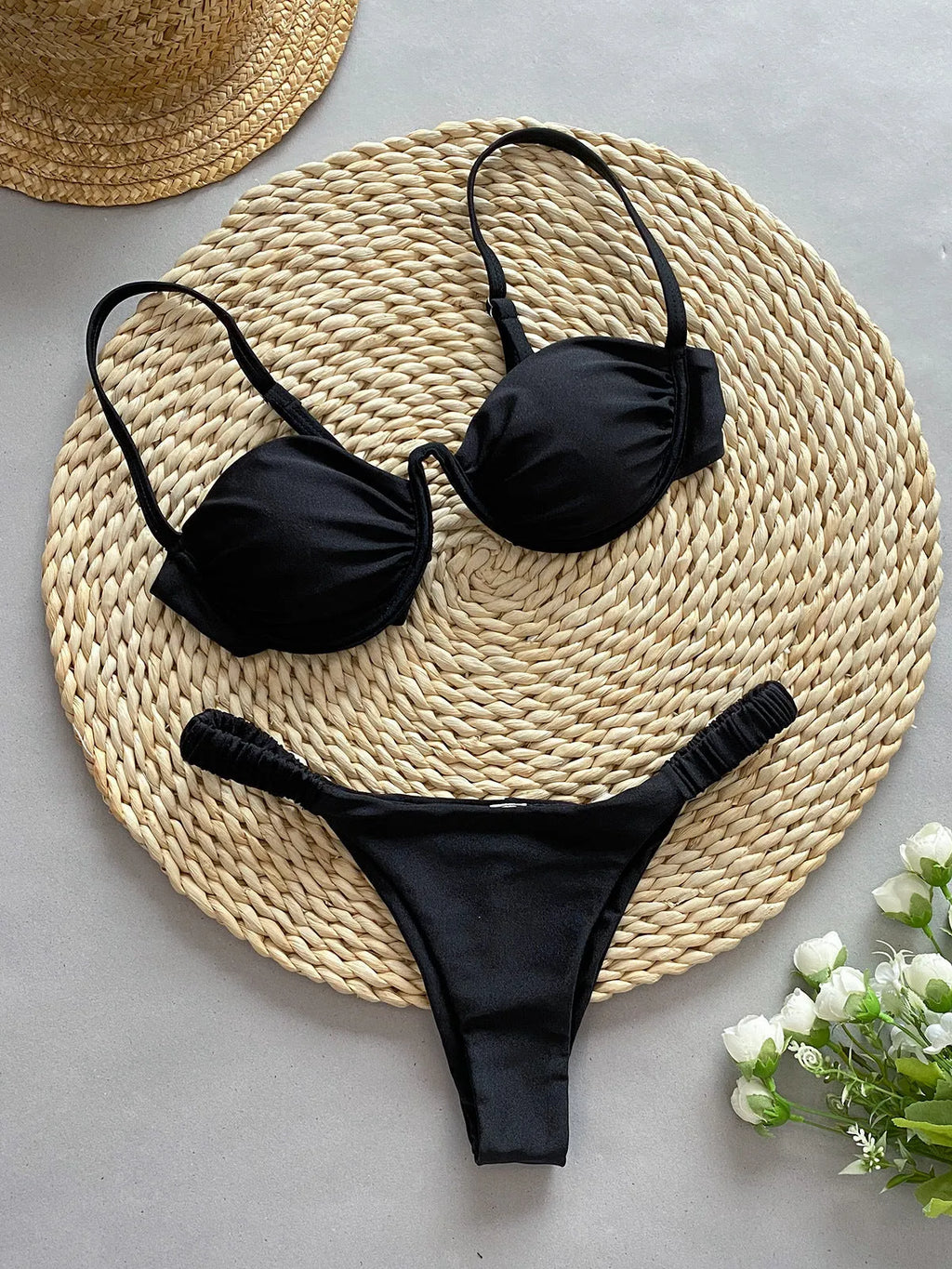 Women's black underwire bikini swimsuit with split design and European sizing