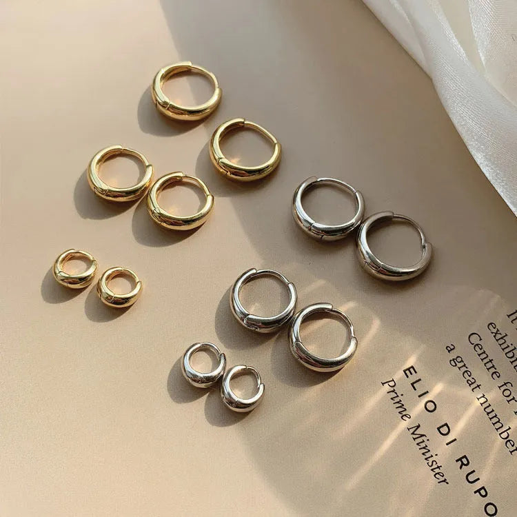 Women's geometric water drop earrings in gold or platinum electroplated copper, showing three size variations