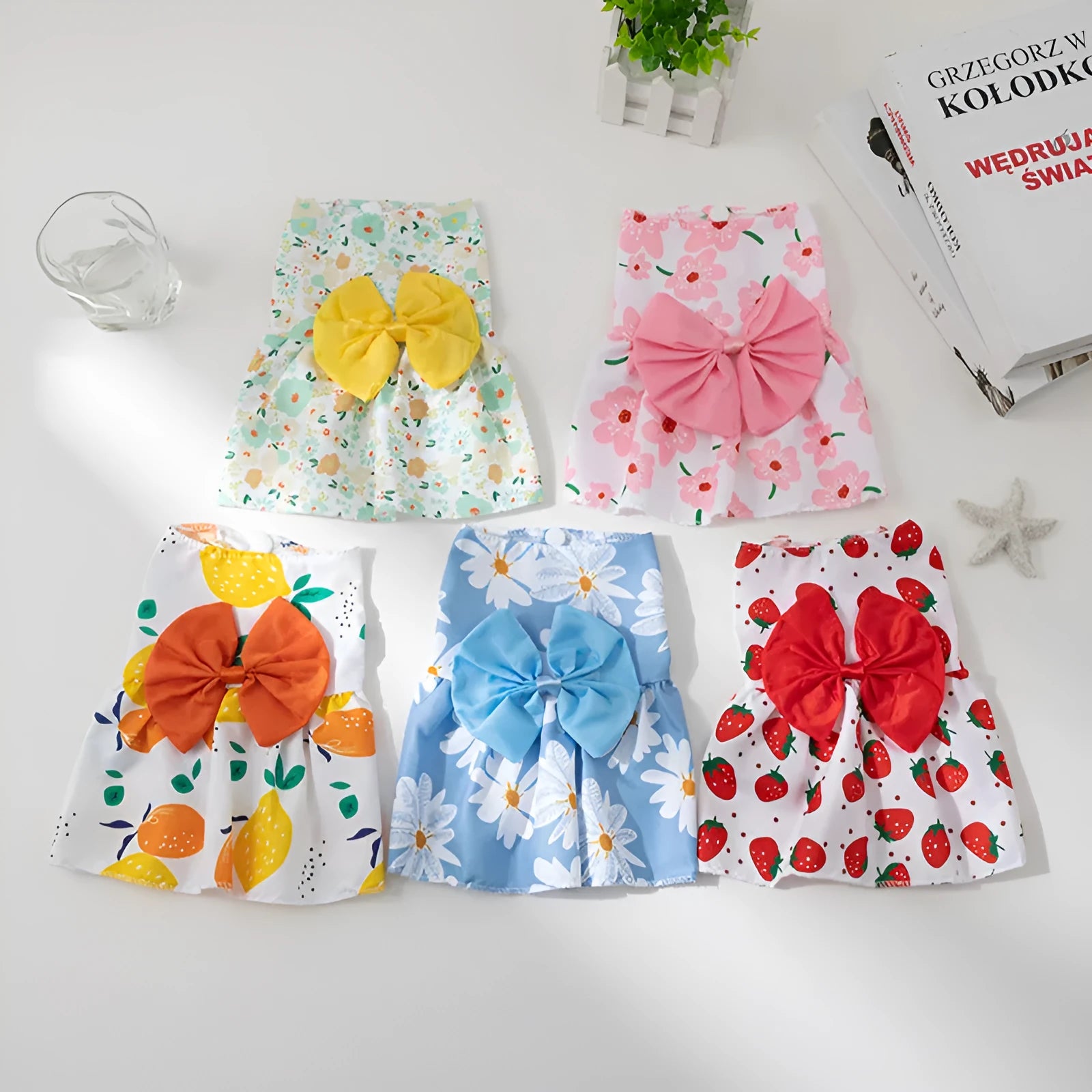 Polyester pet dress with floral butterfly princess design and decorative bow in multiple colour options