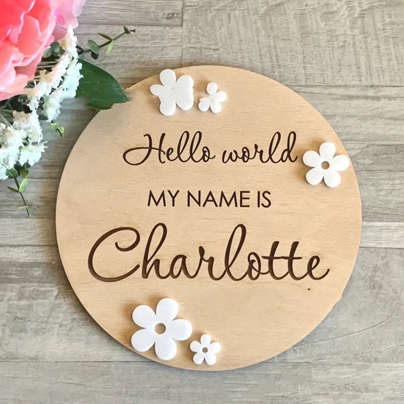 Personalised wooden square sign with baby's name, birth date, time, and weight engraved.