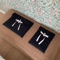 Women's black and white quilted nylon computer bag with ballet bow detail